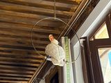 a light that is hanging from the ceiling in a room