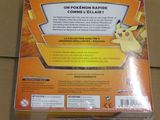 the box of the pokemon trading card game is on the floor