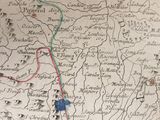 a map of the country with pins on it
