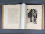 an open book with a picture of a building on it
