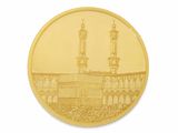 pièce d'or sur laquelle figure une mosquée en arrière-plan