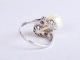 sterling silver ring with a pearl and a flower