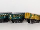a toy train that is sitting on a white surface