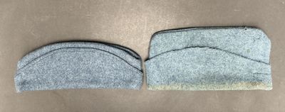 two pieces of felt are sitting next to each other on a table
