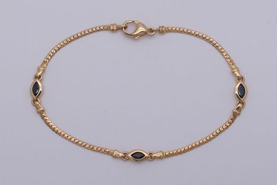 Bracelet en or jaune 750 et saphirs navette. - Photo 1