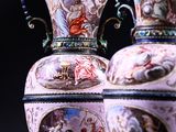 three vases that are sitting on top of each other