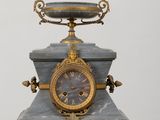 a clock that is sitting on top of a table