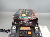 a box with a video game on it and a remote control