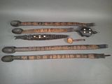several different types of spoons and utensils on a table