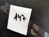 a piece of paper that has a sticker on it