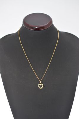 COLLIER en or, pendentif coeur serti diamants et pierres ver…