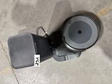 an overhead view of a parking meter on the ground