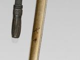 two different types of swords that are on display
