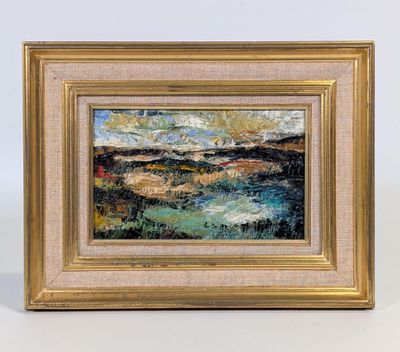 un tableau représentant un paysage, dans un cadre doré, sur fond blanc