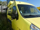 a yellow van that is parked on the side of the road