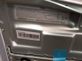 a machine that has a blue tape on the side of it