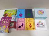 a lot of children ' s books that are on the table