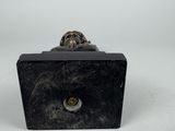an image of a black box with a metal handle on a white background