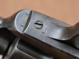 a close up of a gun that is on a table