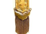 a picture of a gold necklace with a cat on it