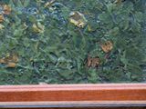 a picture of a close up of a painting on a window sill