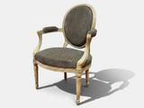 l'image d'une chaise posée sur une surface blanche