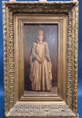 an old picture of a woman in a dress and gloves