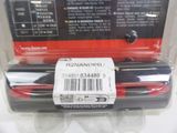 a black and red cell phone in a plastic package