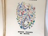 un livre sur lequel figure l'image d'une femme et d'un oiseau