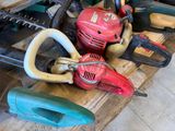 many different types of chainsaws on a table