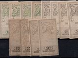 a group of five stamps with a picture of a man and a woman on them