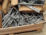 a box full of screws and bolts in a warehouse