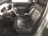 a picture of the inside of a car with the front seats down