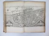 an old book with a map of a city on it
