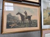two framed pictures of a man riding a horse and a dog