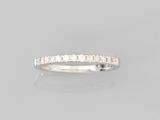 a diamond half - eternity ring, by van cleef