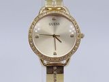 guess watch with gold dial and diamond bezel