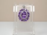 a purple necklace with a purple flower in the center