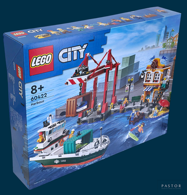une boîte contenant un ensemble Lego City, sur fond bleu