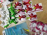 supplies laid out on a table with scissors, tape, scissors, and other items