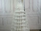 a photo of a wedding dress on a mannequin mannequin