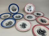 several plates with pictures of people on them on a table