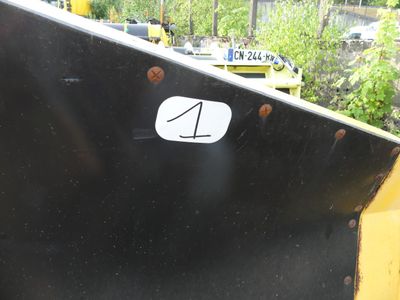 a picture of a close up of a number plate on a construction vehicle