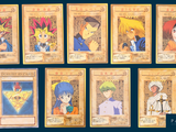 a lot of cards that are on a blue surface