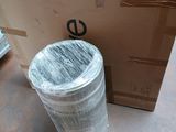 a cardboard box and a plastic cup on a table
