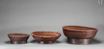 three bowls and a bowl on a table with a gray background