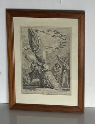 une vieille photo représentant un homme tenant un gros objet dans la main