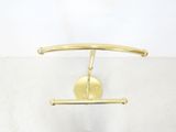 a metal object that is hanging on the wall
