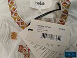 a label on a dress that says ba & sh