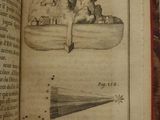 an open book with a drawing of a boat and a man in a boat